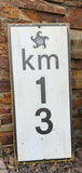 KM 13 Sign